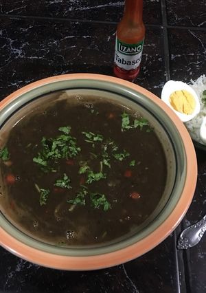 A picture of Sopa Negra with Hard-Boiled Egg 🥚🍵.