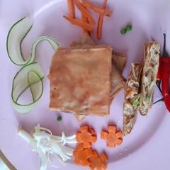 A picture of Chicken cheese pocket parcel.