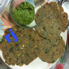 Rj speciaGreen garlic bajri methi thepla with coriander chutney A picture of Rj speciaGreen garlic bajri methi thepla with coriander chutney.