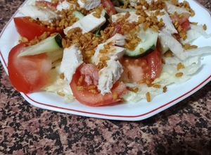 Foto principal de Ensalada de pollo y arroz inflado