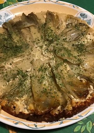 Une photo de Flan d endives caramélisées à la ricotta,lomo corse et sirop d’érable