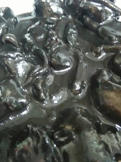 Una foto de Calamares en su tinta