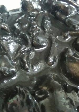 Una foto de Calamares en su tinta