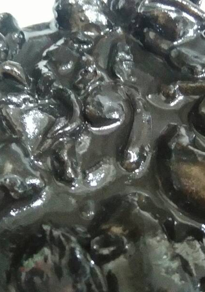 Una foto de Calamares en su tinta