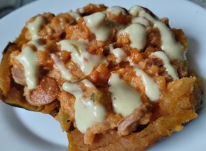 Una foto de Batata / boniato / camote🍠🥙 relleno🥯🍠🍅