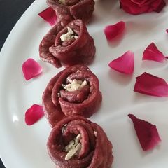 A picture of Rose shape gujiya urad daal ki bharawan se.