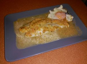 Una foto de Panga al horno en salsa de ajo y limón