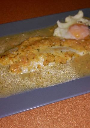 Una foto de Panga al horno en salsa de ajo y limón