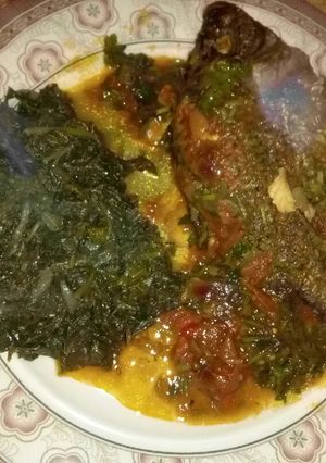A picture of Ugali, fish & coconut milk mchicha@cocomchicha😮.