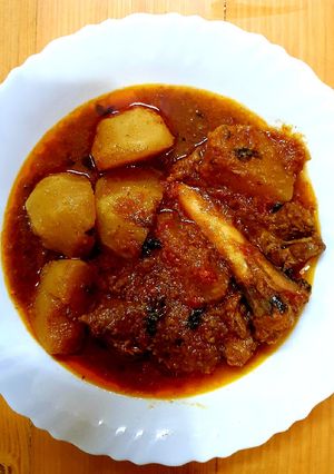 A picture of SHALJUM GHOST Turnip meat curry.