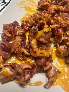 Una foto de Oreja de cerdo con salsa brava en airfryer