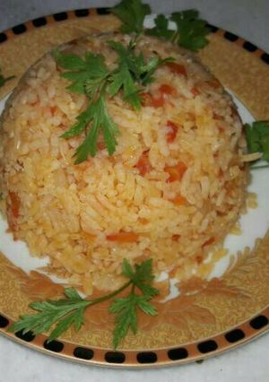 صورة لوصفة رز ببندورة 🍅🍚