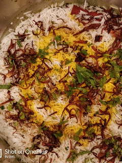 A picture of Chicken dum biryani.