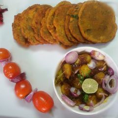 A picture of Tomato kachori with sweet, tangy, spicy,potato.