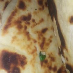 A picture of Garlic naan bread.