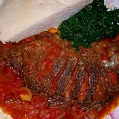 A picture of Tilapia stew,Kales and ugali.