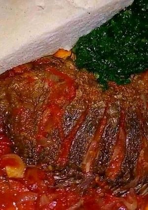 A picture of Tilapia stew,Kales and ugali.