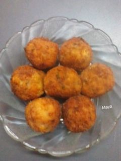A picture of Rice, cheese, Corn balls.