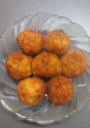A picture of Rice, cheese, Corn balls.