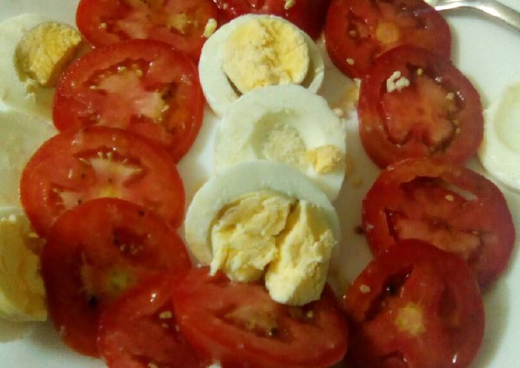 Tomato salad with boiled eggs