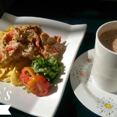 A picture of B/Fast 1(Spiced peppered Egg,chips n Tea).