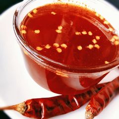 A picture of Sweet and spicy red sauce.