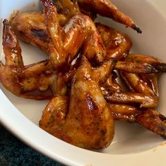A picture of Sticky sweet chicken wings.