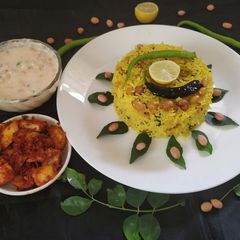 A picture of Lemon Rice With Masala curd.