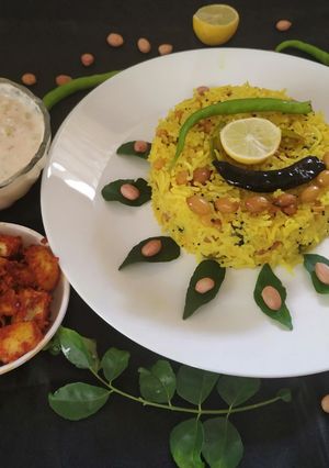 A picture of Lemon Rice With Masala curd.