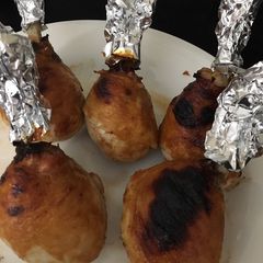 A picture of Lollipop chicken in a root beer barbecue sauce.