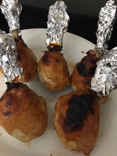 A picture of Lollipop chicken in a root beer barbecue sauce.