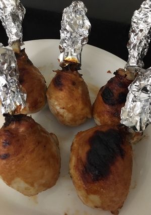 A picture of Lollipop chicken in a root beer barbecue sauce.