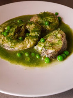 Una foto de Merluza en salsa muy verde