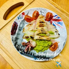A picture of Squid carcasses with avocado.