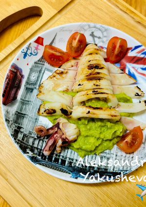 A picture of Squid carcasses with avocado.