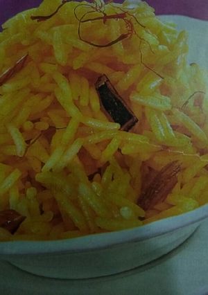A picture of #Festive#Challenge#Baisakhi#post-8#Meethe Peeley Chawal.