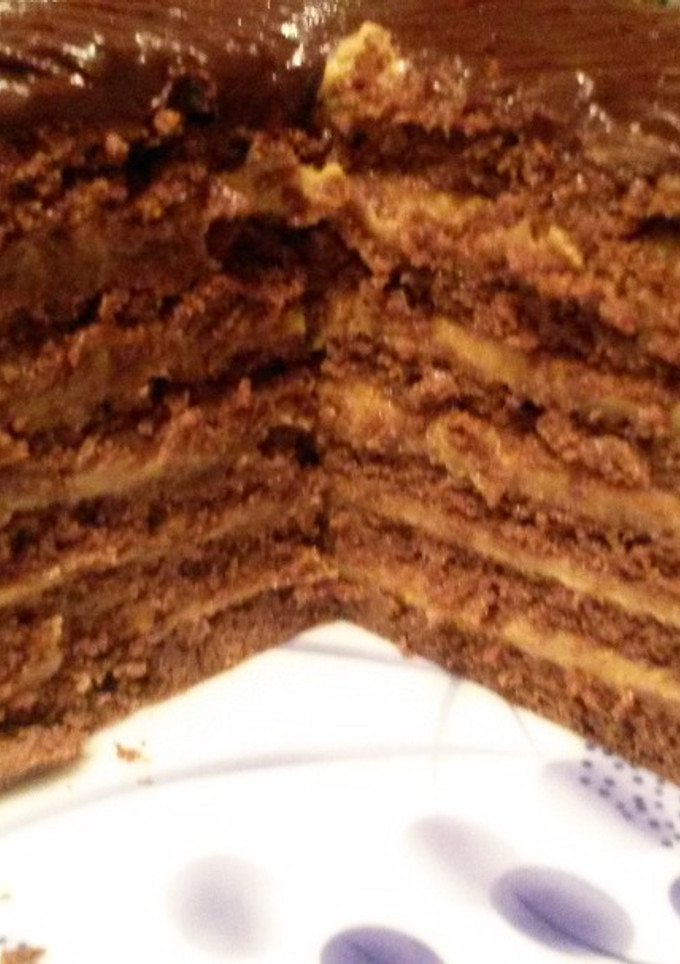 Una foto de Torta de masa oreo con dulce de leche y queso crema