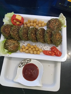 A picture of Chikpice and spinach kabab.