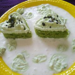 Spinach suji dhokla with hung curd froasting A picture of Spinach suji dhokla with hung curd froasting.