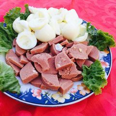A picture of Eggs and special garlic polony.