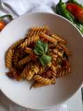 Fusilli con friggitelli, pomodorini ciliegino e salsiccia di Norcia