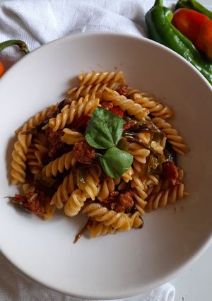 A picture of Fusilli with Friggitelli Peppers, Cherry Tomatoes, and Norcia Sausage.