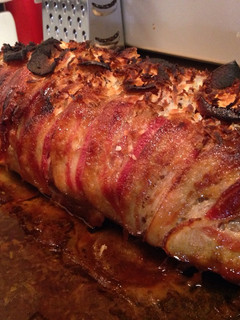 A picture of Apple cinnamon bacon wrapped pork shoulder.