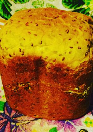 Una foto de Pan con semillas de linaza en máquina