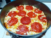 Una foto de salsa para pizza casera