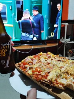 Una foto de Pizza Rápida