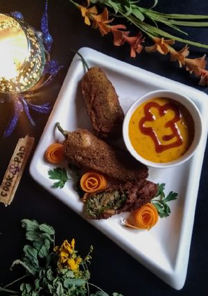 A picture of Peri bites with twist and mustard dynamite sauce.