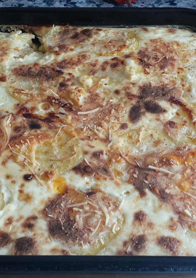 Una foto de Patatas a la crema con bacon