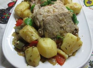 Una foto de Cinta de lomo al vino dulce con patatas