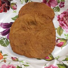 A picture of Adhirsam (sweet of rice flour and jaggery).